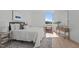 Bright bedroom featuring natural light and neutral décor, with warm textures and a picturesque view at 1302 Chamblee Hill Ct, Raleigh, NC 27608