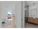 Open main bedroom and bathroom suite featuring modern design and ample natural light at 1302 Chamblee Hill Ct, Raleigh, NC 27608