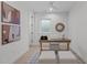 Bright office space featuring light hardwood floors, modern art, and a decorative mirror at 1302 Chamblee Hill Ct, Raleigh, NC 27608