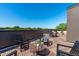 Cozy rooftop deck with seating, potted plants, and an outdoor lounge area at 1302 Chamblee Hill Ct, Raleigh, NC 27608
