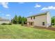 Large backyard with a shed, patio, and plenty of space for outdoor activities at 1307 Torrey Pines Ct, Mebane, NC 27302