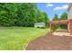 Beautiful backyard with a shed and a patio with pergola at 1307 Torrey Pines Ct, Mebane, NC 27302