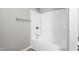Clean and functional shower featuring a white surround, modern fixtures, and neutral tones at 1307 Torrey Pines Ct, Mebane, NC 27302