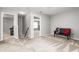 Upstairs hallway with carpet, entryways and a small bench at 1307 Torrey Pines Ct, Mebane, NC 27302