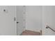 Bright hallway featuring clean lines and a minimalist aesthetic, leading to other areas of the home at 1308 Chamblee Hill Ct, Raleigh, NC 27608