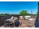 Rooftop deck with a dining table and lounge seating at 1308 Chamblee Hill Ct, Raleigh, NC 27608