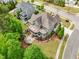 Stunning aerial view of a home featuring outdoor living and professionally landscaped yard at 1308 Green Oaks Pkwy, Holly Springs, NC 27540