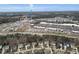 An aerial view of 12 Oaks community shows the close proximity to shopping at Target and Grand Hill Place at 1308 Green Oaks Pkwy, Holly Springs, NC 27540