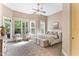 Bright main bedroom filled with natural light through multiple windows, creating a serene atmosphere at 1308 Green Oaks Pkwy, Holly Springs, NC 27540