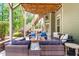 The outdoor patio offers an open air space, stylish seating and patio lighting at 1308 Green Oaks Pkwy, Holly Springs, NC 27540