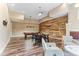 Spacious game room with a pool table and a statement wood accent wall at 1308 Green Oaks Pkwy, Holly Springs, NC 27540