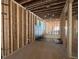 Unfinished basement framing ready for customization at 1500 Ridge Rd, Raleigh, NC 27607