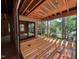 Partially built patio area with wood deck framing, exposed ceiling, and an open view to the backyard at 1500 Ridge Rd, Raleigh, NC 27607
