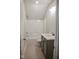 Neutral bathroom showcasing a vanity with hard surface countertop, shower-tub combo, and tile flooring at 155 Diamond Creek Dr, Zebulon, NC 27597