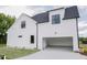 View of the house showing a two car garage at 155 Diamond Creek Dr, Zebulon, NC 27597