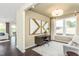 Bright home office space with a large window, desk, and comfortable seating area at 1606 Garden Park Cir, Fuquay Varina, NC 27526
