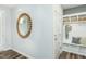 Mudroom featuring coat hooks, seating, and storage cubbies, perfect for organization at 1614 Garden Park Cir, Fuquay Varina, NC 27526
