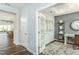 Bright office space featuring a desk and view into the living and dining area at 1614 Garden Park Cir, Fuquay Varina, NC 27526