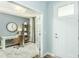 Inviting office space with French doors and a view into the entryway at 1614 Garden Park Cir, Fuquay Varina, NC 27526