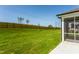 Spacious backyard featuring a well-manicured lawn and a newly installed wooden fence at 1622 Garden Park Cir, Fuquay Varina, NC 27526