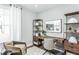 Cozy home office with natural light and built-in shelving at 1626 Garden Park Cir, Fuquay Varina, NC 27526