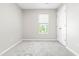 Clean bedroom with neutral walls, carpet flooring, natural light, and closet at 1628 Briarmont Court Ct, Raleigh, NC 27610