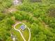 Gorgeous aerial view of a stunning home nestled among greenery at 169 Country Brooke Lane Ln, Roxboro, NC 27574