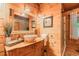 Elegant bathroom with wooden vanity, vessel sink, and glass-enclosed shower at 169 Country Brooke Lane Ln, Roxboro, NC 27574