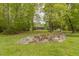 Picturesque wooded exterior with stone details, and a large yard at 169 Country Brooke Lane Ln, Roxboro, NC 27574