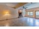Inviting living room featuring tile floors, stone fireplace, and ample natural light at 169 Country Brooke Lane Ln, Roxboro, NC 27574