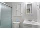 Bathroom featuring a glass enclosed shower and a sleek, white vanity at 1800 Tarbert Dr, Cary, NC 27511