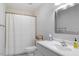 Clean bathroom featuring a shower with white curtain and a single sink vanity at 1800 Tarbert Dr, Cary, NC 27511