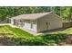 Inviting single-story home with a well-kept lawn and gravel landscaping at 1800 Tarbert Dr, Cary, NC 27511