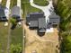 An aerial view depicts the landscaping and home's layout at 1903 Edgerton Dr, Durham, NC 27703