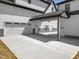 Spacious driveway area leading to the main house and attached two-car garage at 1903 Edgerton Dr, Durham, NC 27703