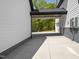 Covered driveway connecting the main house to the garage, offering protection from the elements at 1903 Edgerton Dr, Durham, NC 27703