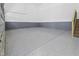 Spacious garage featuring epoxy flooring, ample lighting, and easy access to the main house at 1903 Edgerton Dr, Durham, NC 27703