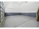 Spacious garage featuring epoxy flooring, ample lighting, and easy access to the main house at 1903 Edgerton Dr, Durham, NC 27703