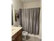 Full bathroom featuring a shower/tub combo, sink and neutral color scheme at 204 Plank Bridge Way, Morrisville, NC 27560