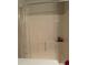 Clean shower stall with built-in shelves and a clear shower curtain at 204 Plank Bridge Way, Morrisville, NC 27560