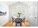 Charming breakfast nook with natural light provided by an arched window at 210 Millet Dr, Morrisville, NC 27560