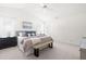 Bright bedroom with neutral decor, large windows, and vaulted ceiling at 210 Millet Dr, Morrisville, NC 27560