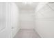 Walk-in closet providing ample storage space with shelving at 210 Millet Dr, Morrisville, NC 27560