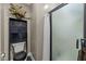 Bathroom showcasing a tiled standing shower and dark wood storage cabinet at 226 Fletcher Ridge Rd, Timberlake, NC 27583