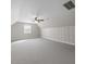 Bonus room featuring vaulted ceiling, wainscotting and neutral colored carpet at 226 Fletcher Ridge Rd, Timberlake, NC 27583