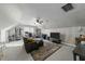 Attic bonus room featuring plush carpet, a comfortable couch and tv, perfect for entertaining at 226 Fletcher Ridge Rd, Timberlake, NC 27583