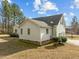 Exterior view of home with vinyl siding, well-manicured lawn and a driveway at 226 Fletcher Ridge Rd, Timberlake, NC 27583