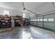 Spacious garage with ample storage space and an automatic door at 226 Fletcher Ridge Rd, Timberlake, NC 27583