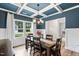 Bright dining room with a decorative ceiling and seating for six at 233 Berg St, Smithfield, NC 27577