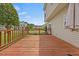 Large wooden deck with a railing, perfect for outdoor entertaining, providing great views of the backyard at 2429 Follow Me Way, Raleigh, NC 27610